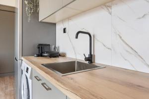 A kitchen or kitchenette at Dimargi Apartments