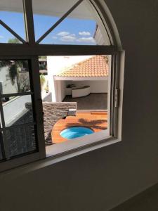 Un balcón o terraza en LA CASA BLANCA Suites Tepic SPA Familiar