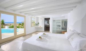 Mykonos Dream Villas में एक कमरे में एक या कई बेड