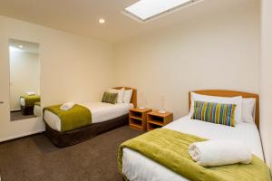 Voodi või voodid majutusasutuse Aspen Court Motel Taihape toas