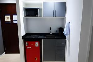 Dapur atau dapur kecil di Paulista Premium Flat