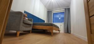 Posteľ alebo postele v izbe v ubytovaní Oak Apartament Rumia Aquapark