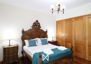 Una cama o camas en una habitación de MyStay - Lagos House