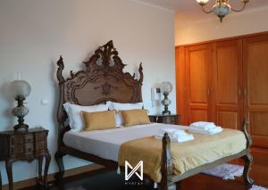 Una cama o camas en una habitación de MyStay - Lagos House