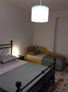 Una cama o camas en una habitación de CasaGiulia2Apartament