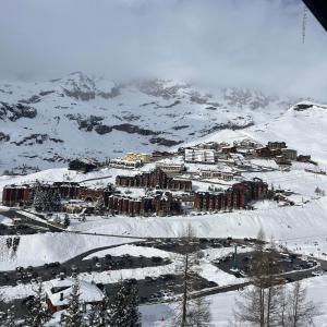 a resort in the snow on top of a mountain at appartamento Cervinia fronte Funivie in Breuil-Cervinia