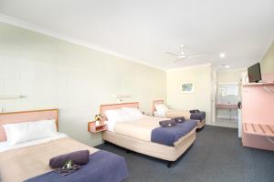 Voodi või voodid majutusasutuse Yungaburra Park Motel toas