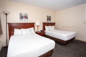 Krevet ili kreveti u jedinici u objektu Canadas Best Value Inn & Suites-Charlottetown