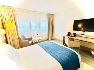 Gulta vai gultas numurā naktsmītnē Best Western Plus Paris Orly Airport