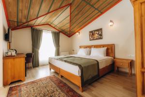 Voodi või voodid majutusasutuse Cappadocia Villa Comfort toas