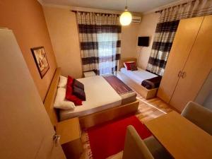 Giường trong phòng chung tại Hotel Algo