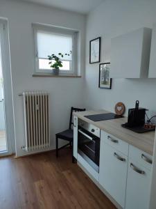 Η κουζίνα ή μικρή κουζίνα στο Maisonette Wohnung 110qm in Linz.