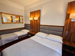 Hotel Hawana में एक कमरे में एक या कई बेड