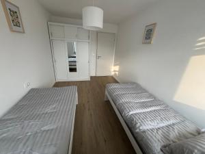 Una cama o camas en una habitación de Apartmaji Čepon