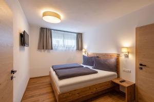 Ένα ή περισσότερα κρεβάτια σε δωμάτιο στο Appartement Auwald