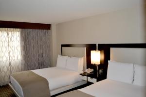 Krevet ili kreveti u jedinici u okviru objekta DoubleTree by Hilton Hotel Houston Hobby Airport