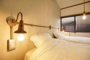 Katil atau katil-katil dalam bilik di Guesthouse Yumi to Ito - Vacation STAY 94562v