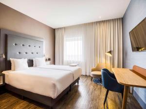 Posteľ alebo postele v izbe v ubytovaní Mercure Hotel Amersfoort Centre