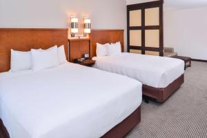 Giường trong phòng chung tại Hyatt Place Chesapeake