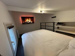 Cama ou camas em um quarto em Le Paddock - COSY FLAT Senlis