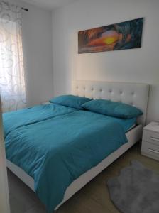 Cama ou camas em um quarto em Appartamento al Sereno