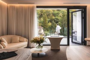 Кът за сядане в 6717 Nature Hôtel & Spa Le Clos des Délices