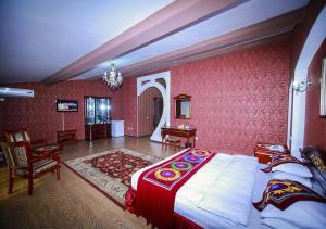 ORIYO DUSHANBE HOTEL में एक कमरे में एक या कई बेड