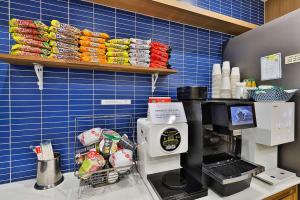 a kitchen with a coffee maker on a counter at Hotel Palace Gyeongju in Gyeongju