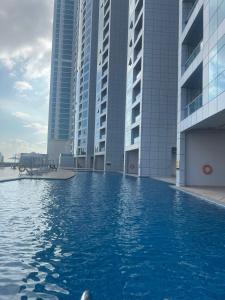 Swimming pool sa o malapit sa Sunset Beach View Holiday Homes