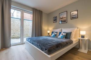 Voodi või voodid majutusasutuse Premium Business Appartement Wiesbaden toas