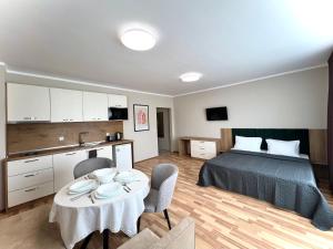 Кровать или кровати в номере Sineva Del Sol Apartments