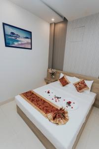 Voodi või voodid majutusasutuse Khoa Hotel Phan Thiết toas