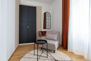 Predel za sedenje v nastanitvi HM • Artful 1BR Suite, City Nearby