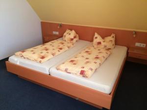 Cama ou camas em um quarto em Hotel Am Salzberg