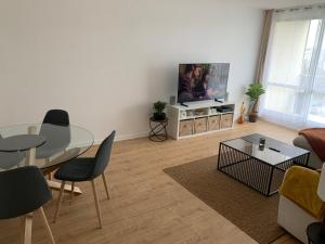 Televizors / izklaižu centrs naktsmītnē Appartement 50m2 Caen