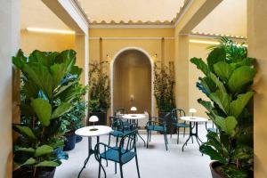 A garden outside Radisson Collection Hotel, Roma Antica