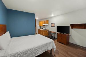 Krevet ili kreveti u jedinici u okviru objekta WoodSpring Suites El Paso