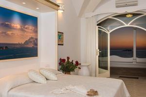 Lova arba lovos apgyvendinimo įstaigoje Villa Santa Chiara Positano Suites