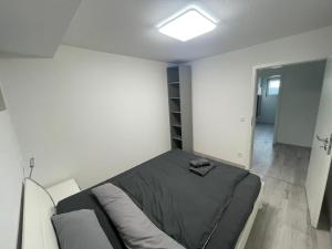 Una cama o camas en una habitación de Blumwohnen in zentraler Lage