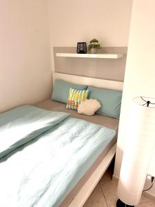 Cama ou camas em um quarto em Apartment Cuore del Lido