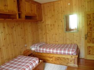 Una cama o camas en una habitación de Bormio Flat