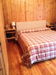 Una cama o camas en una habitación de Bormio Flat