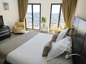 Ліжко або ліжка в номері Cassis Loc - Chambre Meublée