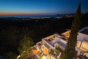 an aerial view of a house at night at Victoria Sunset Suites in San Antonio