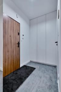 Зображення з фотогалереї помешкання Apartament Sztuk Pięknych 14 у місті Піла