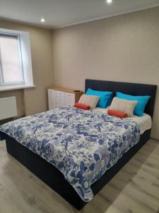 Ліжко або ліжка в номері Kandavas Apartments