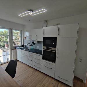 Η κουζίνα ή μικρή κουζίνα στο City Apartments Offenbach