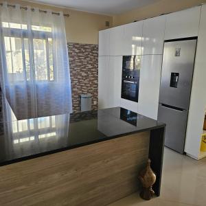 Appartements à louer chez Vitalina में रसोई है