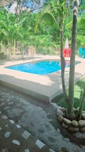 The swimming pool at or close to Casa linda a 5 km de Girardot.