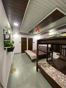 Tempat tidur dalam kamar di Rock n Ocean2 , Beach stay